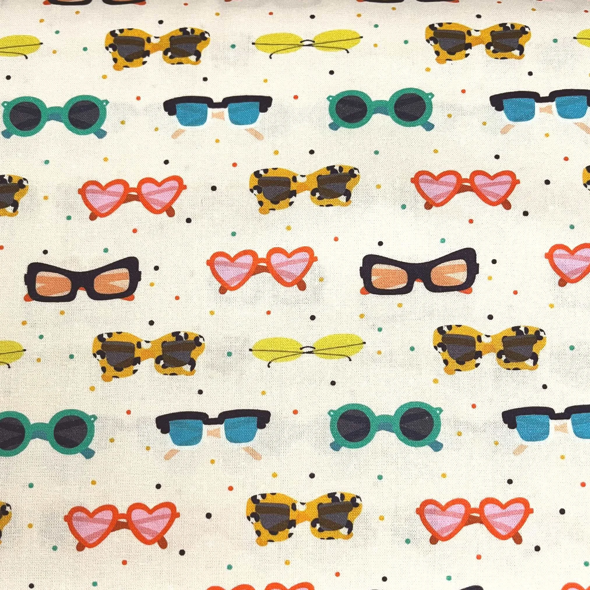 Little Johnny Sunnies Cotton Fabric cream base sold in half meters in UK. Pattern Paper Scissors